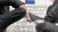 Pilirea materialului rămas cu pilă NAILSUP după îndepărtarea masei principale cu freza